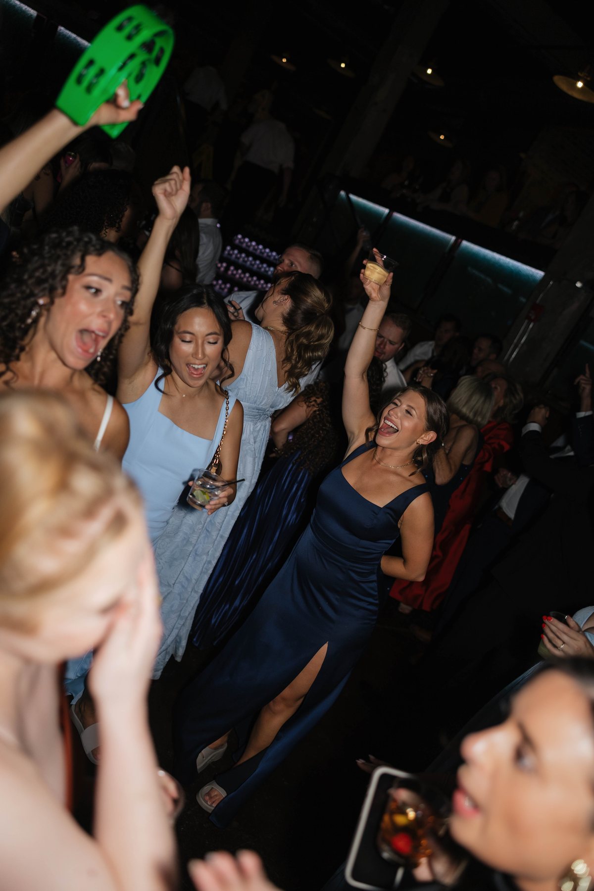 Guests dancing with a tambourine